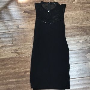 Black stretch dress with mesh top.